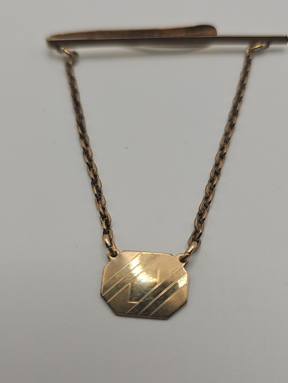 Tie Bar With Draped Chain By KIERSLER. USA Vintage 1940-19508